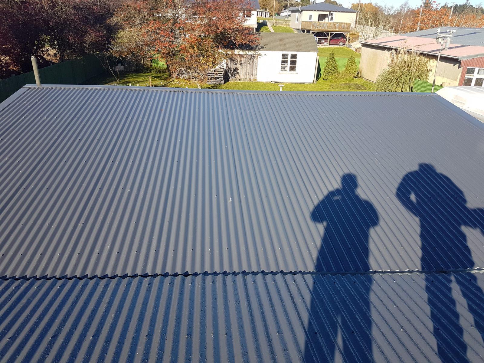 2 Stromness St Palmerston Jeff and one of the team inspecting the roof