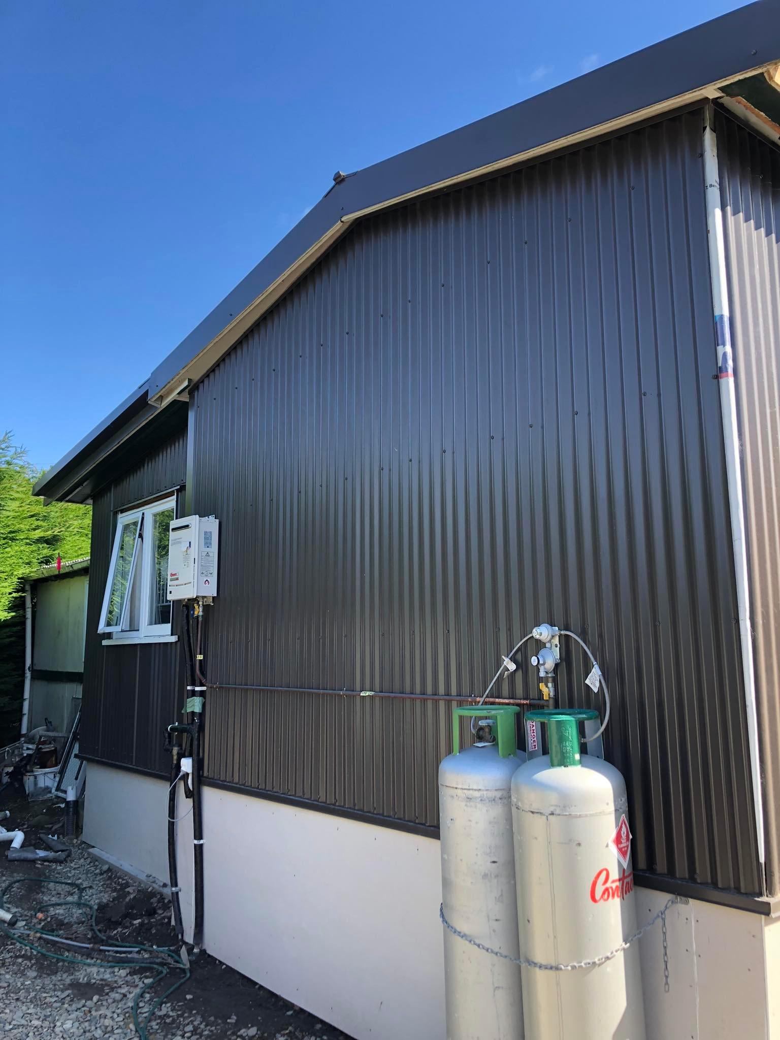 Semple Street Kakanui Renovation using MagnaFlow corrugate as cladding side of house with gas bottles JDBuilders 5