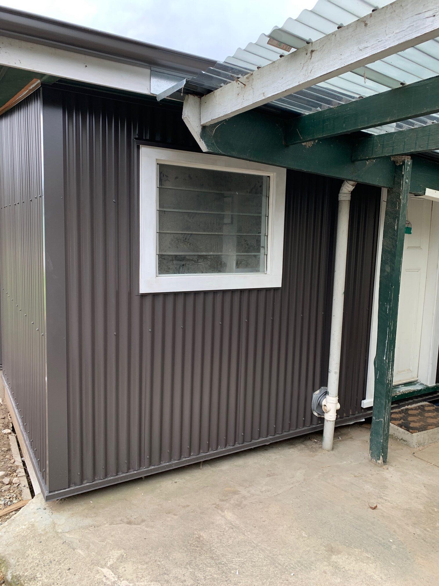 Semple Street Kakanui Renovation using MagnaFlow corrugate as cladding under porch, original windows kept JDBuilders 3