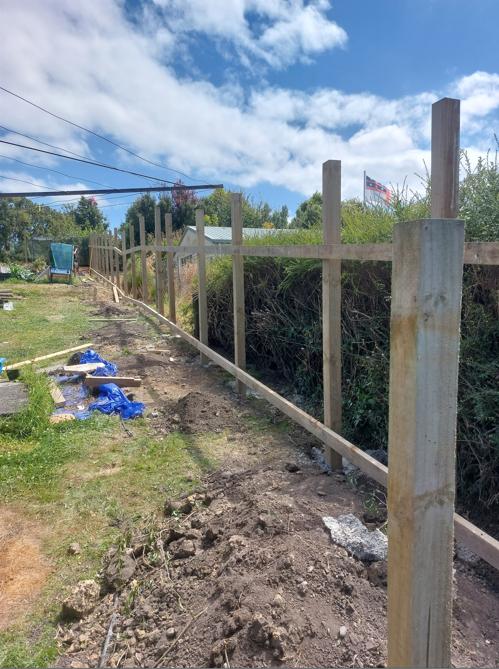 3 13 Beach Street, Waikouaiti Concrete has been poured, bracing taken down and the rails put up and attached to the posts ready for the palings JDBuilders