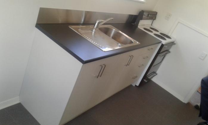 1 Auskerry St Palmerston View from the left of the newly installed kitchen in the investment property JDBuilders