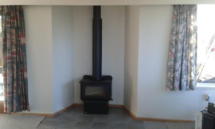 1 Derwent St Oamaru Front view of the completed new fireplace after removing the Wanaka stone JDBuilders