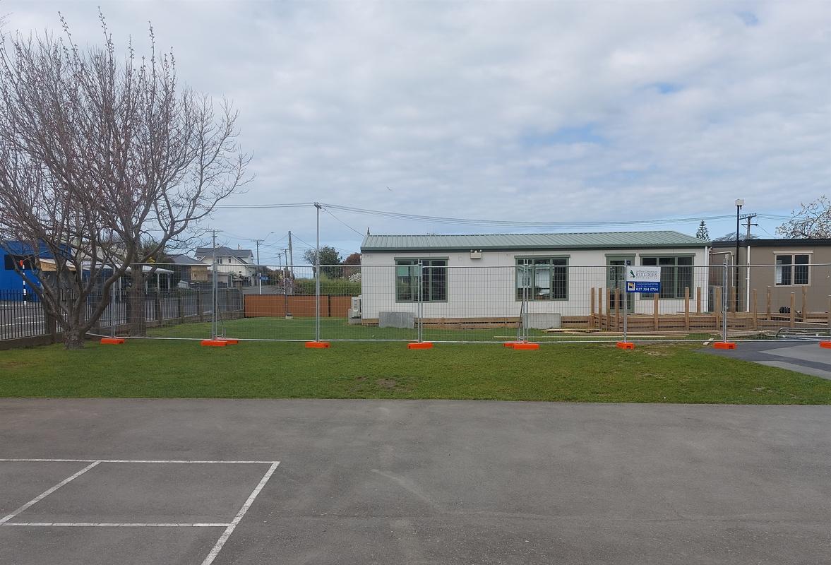 22 Fenwick Primary School, Oamaru Security fencing put up in the main area of the school to protect the public and staff during the demolition process JDBuilders