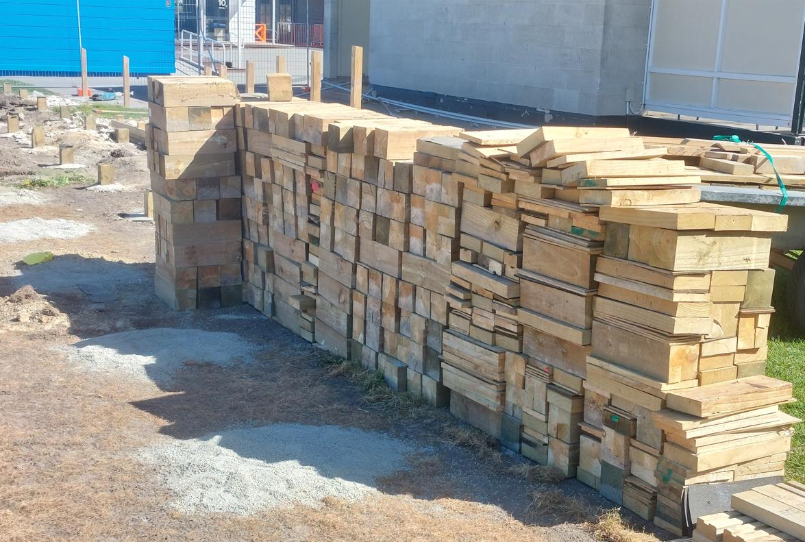 41 Fenwick Primary School, Oamaru Huge pile of wooden blocks used as piles on the learning spaces stacked and ready for removal JDBuilders