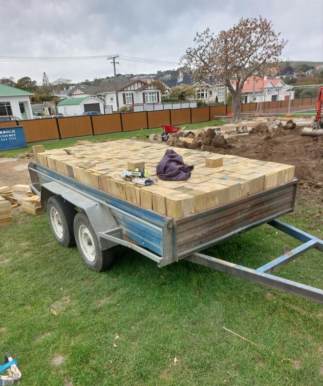 44 Fenwick Primary School, Oamaru Wooden piles on trailer ready for removal JDBuilders