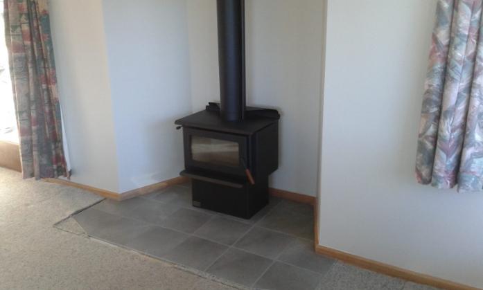 Main Derwent St Oamaru Completion of the new fireplace after removing the Wanaka stone JDBuilders