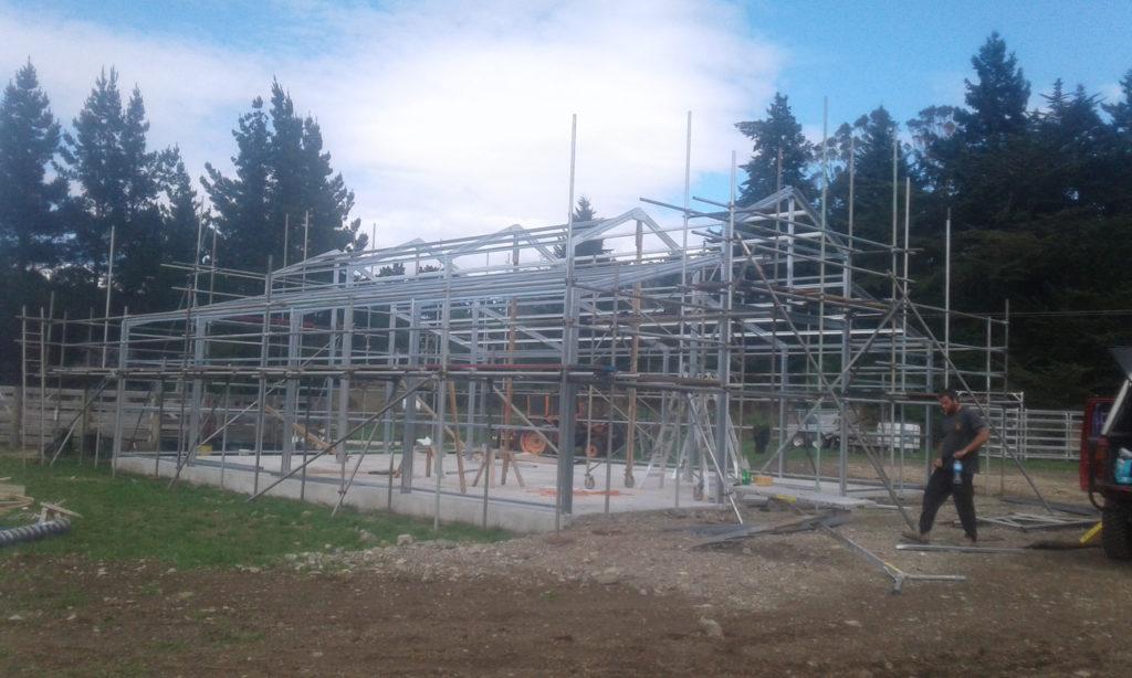 12 Heritage barn Dunback steel frame for new barn almost finished being constructed JDBuilders