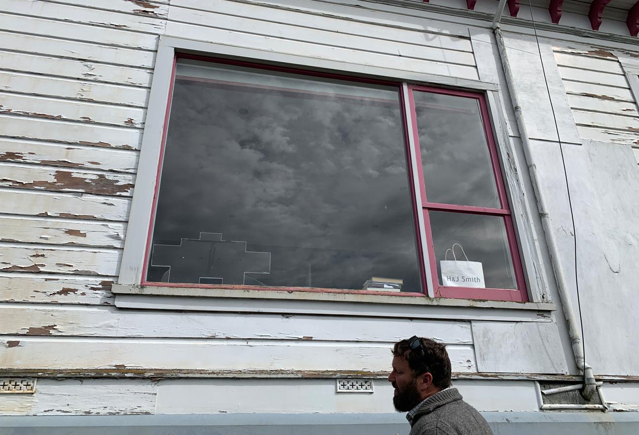 B5 9 Fifield St, Roslyn, Dunedin Jeff inspecting damaged weatherboards and window on the east side, before renovation JDBuilders