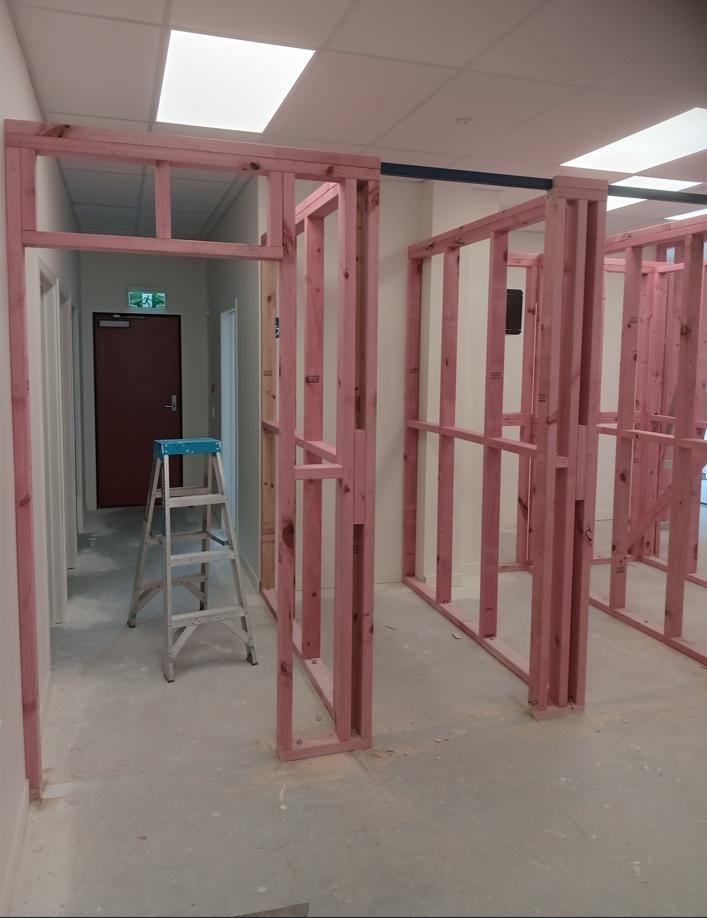 6 42 Thames St, Oamaru Caroline Eve, framing for new changing rooms in the retail space and door into the hallway JDBuilders LR