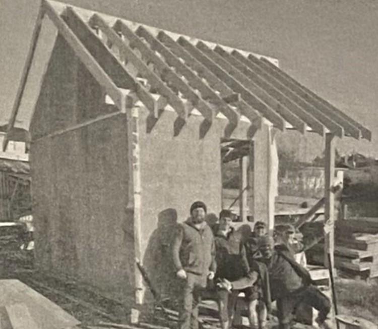 Image of the new toilet block for the Community Workshop at Hampden with the carpenters who worked on the project JDBuilders