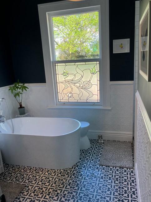 2 426 Herbert Rd, Herbert The completed new bathroom with a view fo the stained glass window in the background JDBuilders