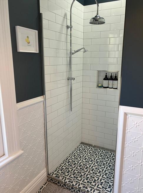 3 426 Herbert Rd, Herbert Completed new bathroom with a view of the new shower, tiles, and pressed tin feature walls JDBuilders