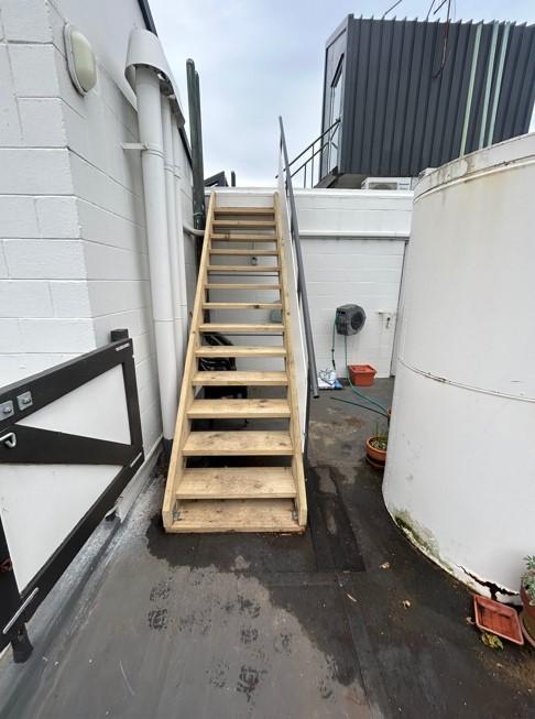 5 27 Arthur Street, Dunedin Straight on view of the newly build stairs with repaired gate and handrail JDBuilders