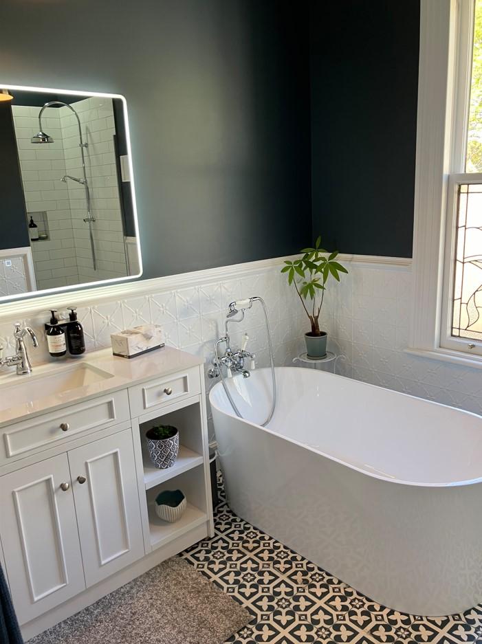 Main 426 Herbert Rd, Herbert Completed new bathroom, view of new bath, vanity, tiles, pressed tin and mirror JDBuilders